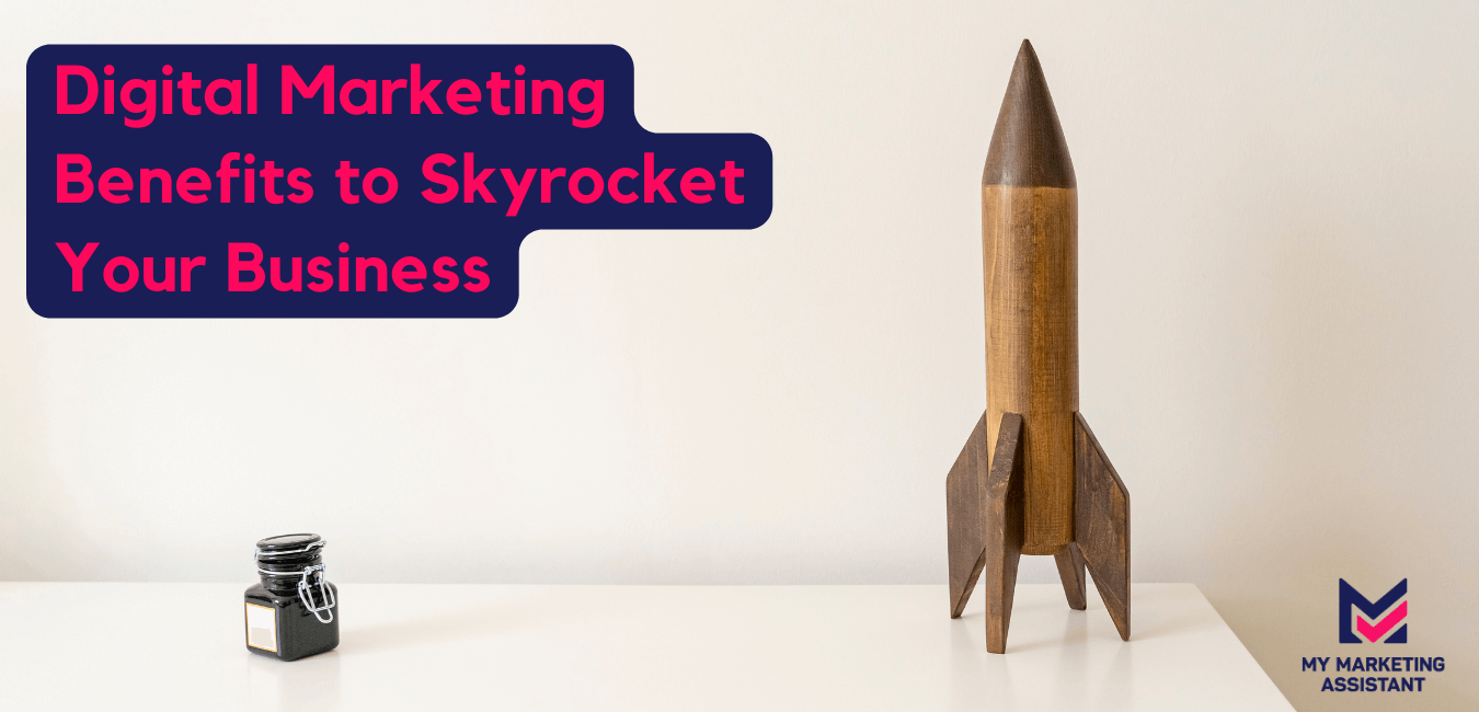 Wooden rocket miniature with bottle of black ink on top of white table