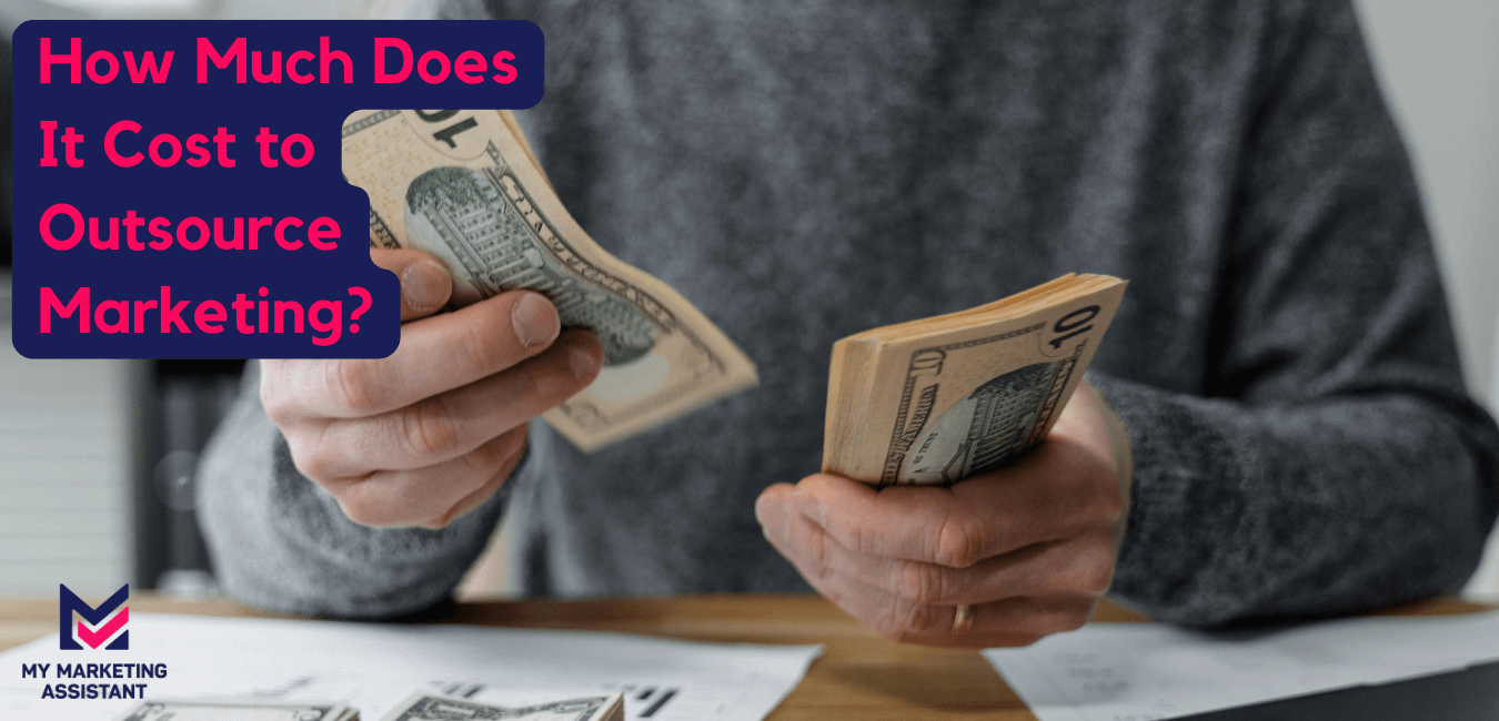 Man wearing sweater sitting at desk counting money
