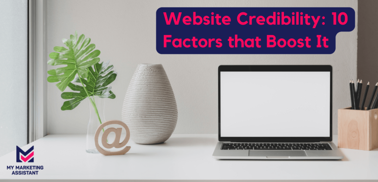 Laptop with a blank white screen, a vase, and a pencil holder on a white table.